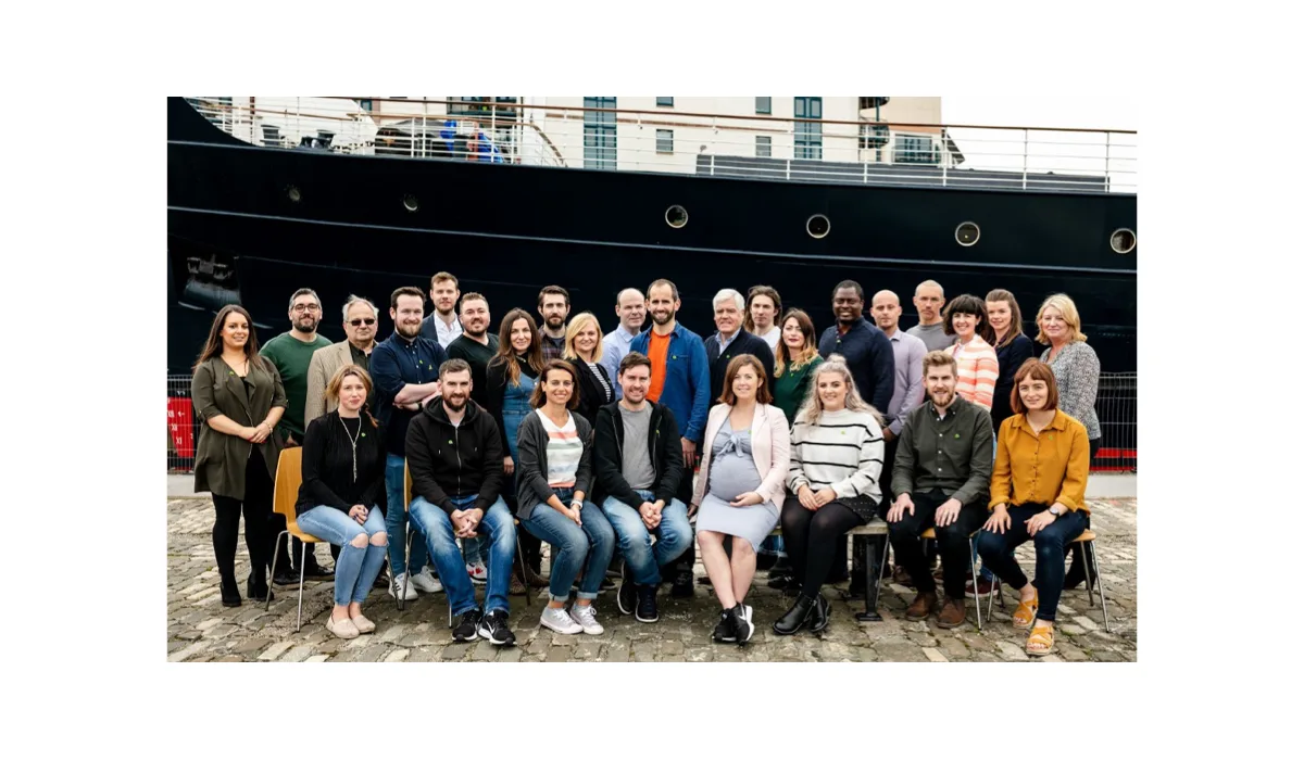 An image of the Amiqus team at a company meet up.