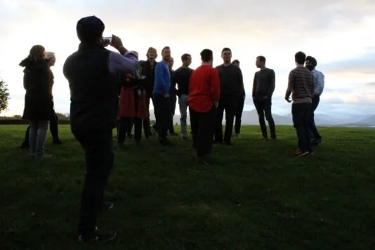 Getting a team photo taken in the great outdoors.