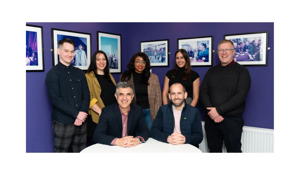 SRC CEO Sabir Zazai and Amiqus CEO Callum Murray with colleagues