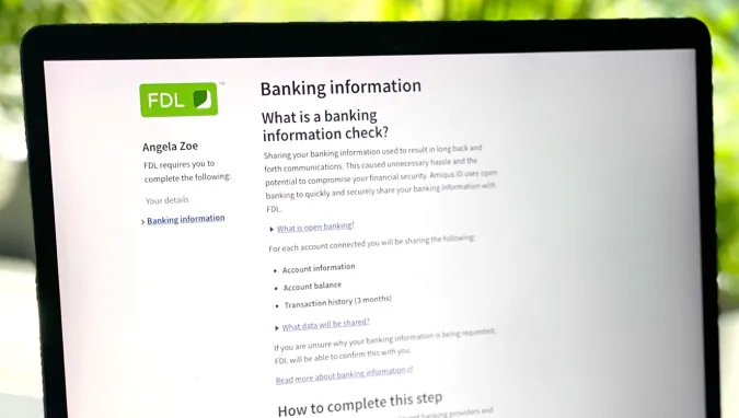 An image of the Amiqus product being used on a laptop device with FDL branding shown on the left of the product.