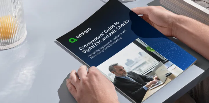 hands holding the Conveyancers' guide to digital KYC and AML checks
