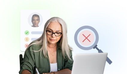 A woman taking notes in front of her laptop with a magnifying glass and checklist in the background